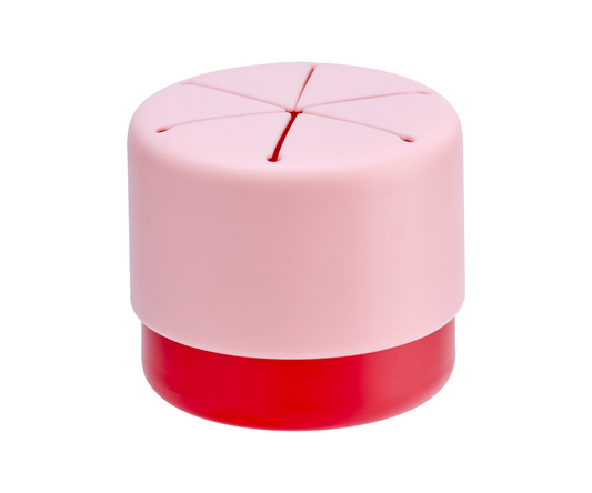 A snack cup with red underneath and pink on the lid