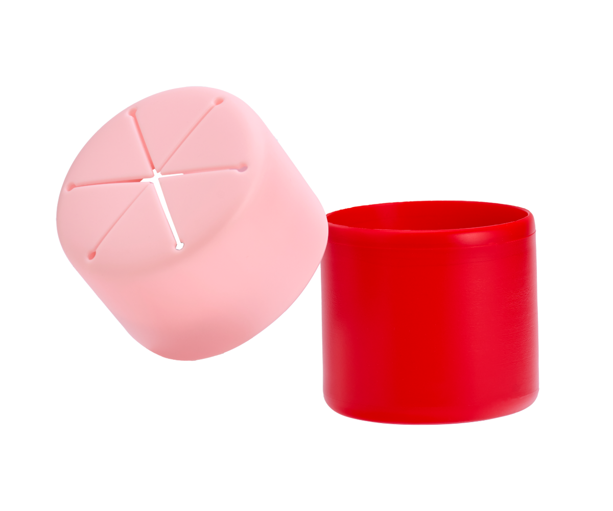 A snack cup with a lid that is red underneath and pink over the lid